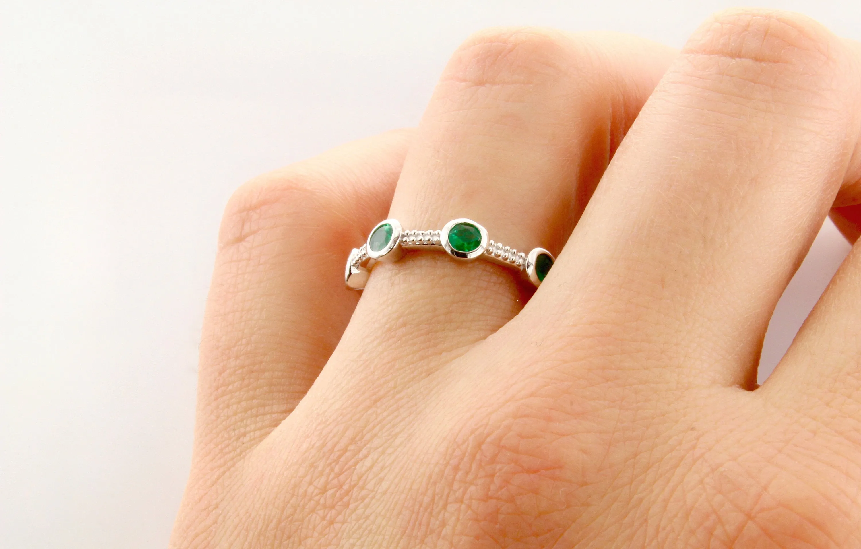 14K Gold Emerald Bezel Half Eternity Band