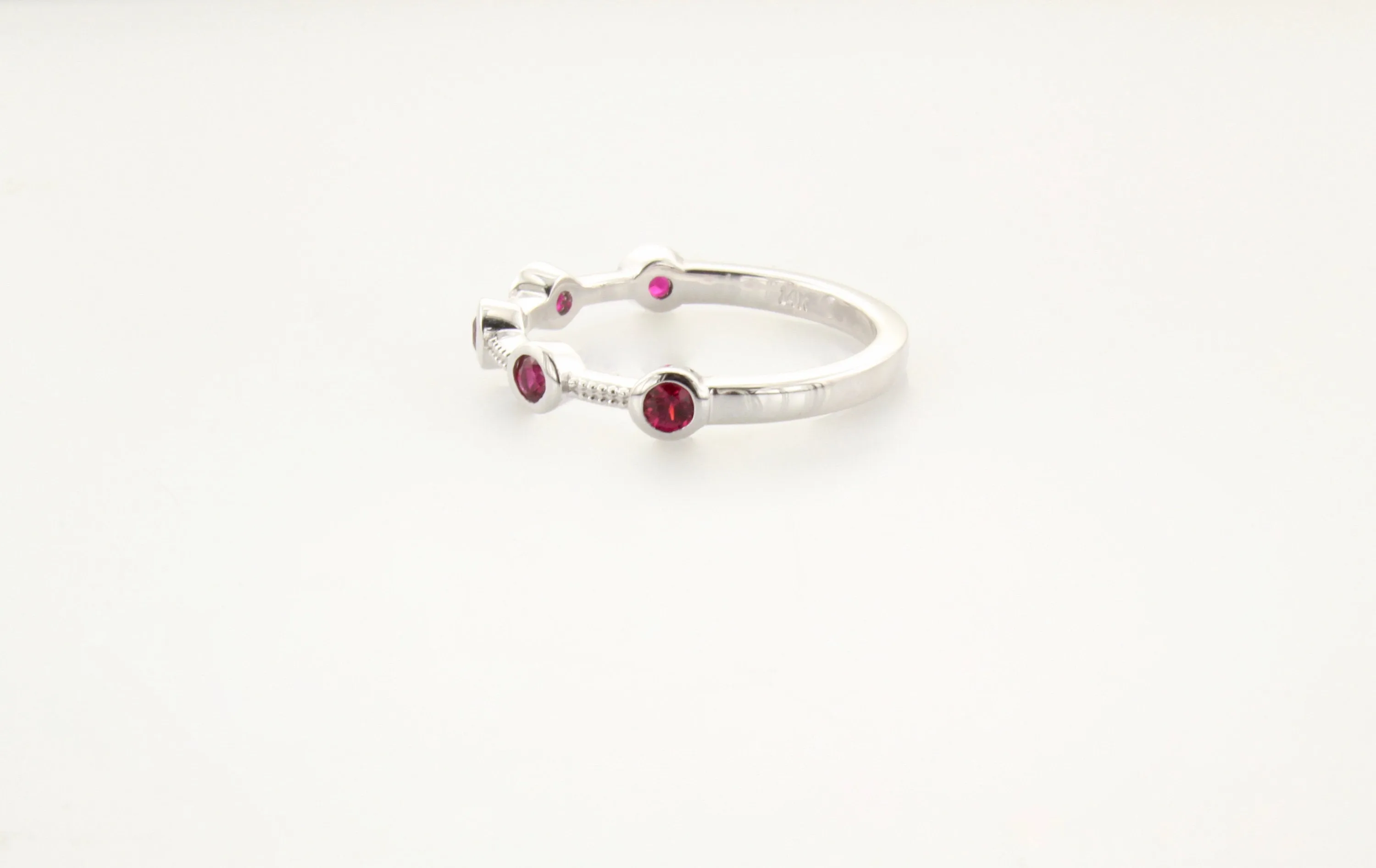 14K Gold Ruby Bezel Half Eternity Band