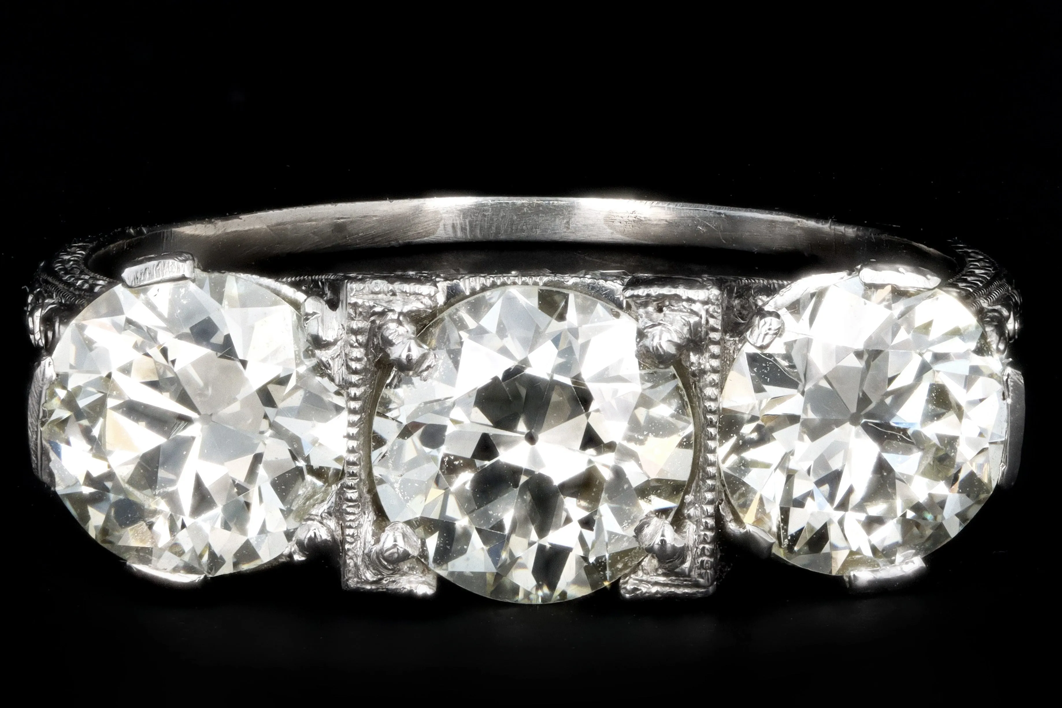 Art Deco C.D. Peacock Platinum 1.24 Carat Old European Cut Diamond Three Stone Ring