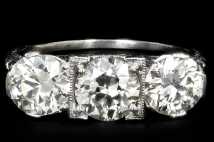 Art Deco C.D. Peacock Platinum 1.24 Carat Old European Cut Diamond Three Stone Ring