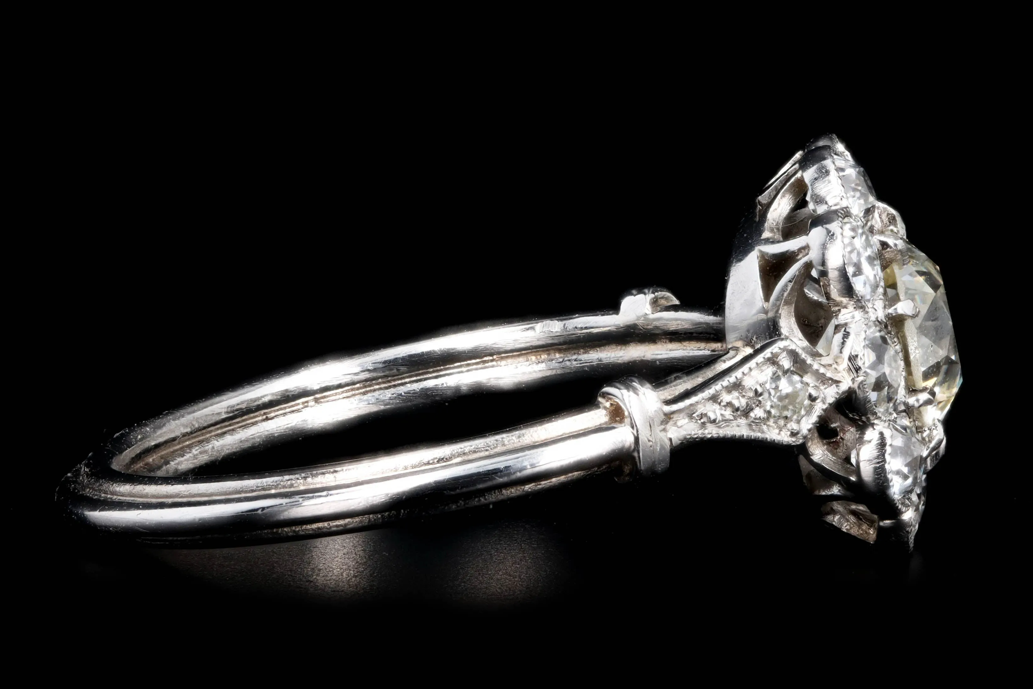 Art Deco Inspired Platinum 0.72 Carat Old European Cut Diamond Halo Cluster Engagement Ring