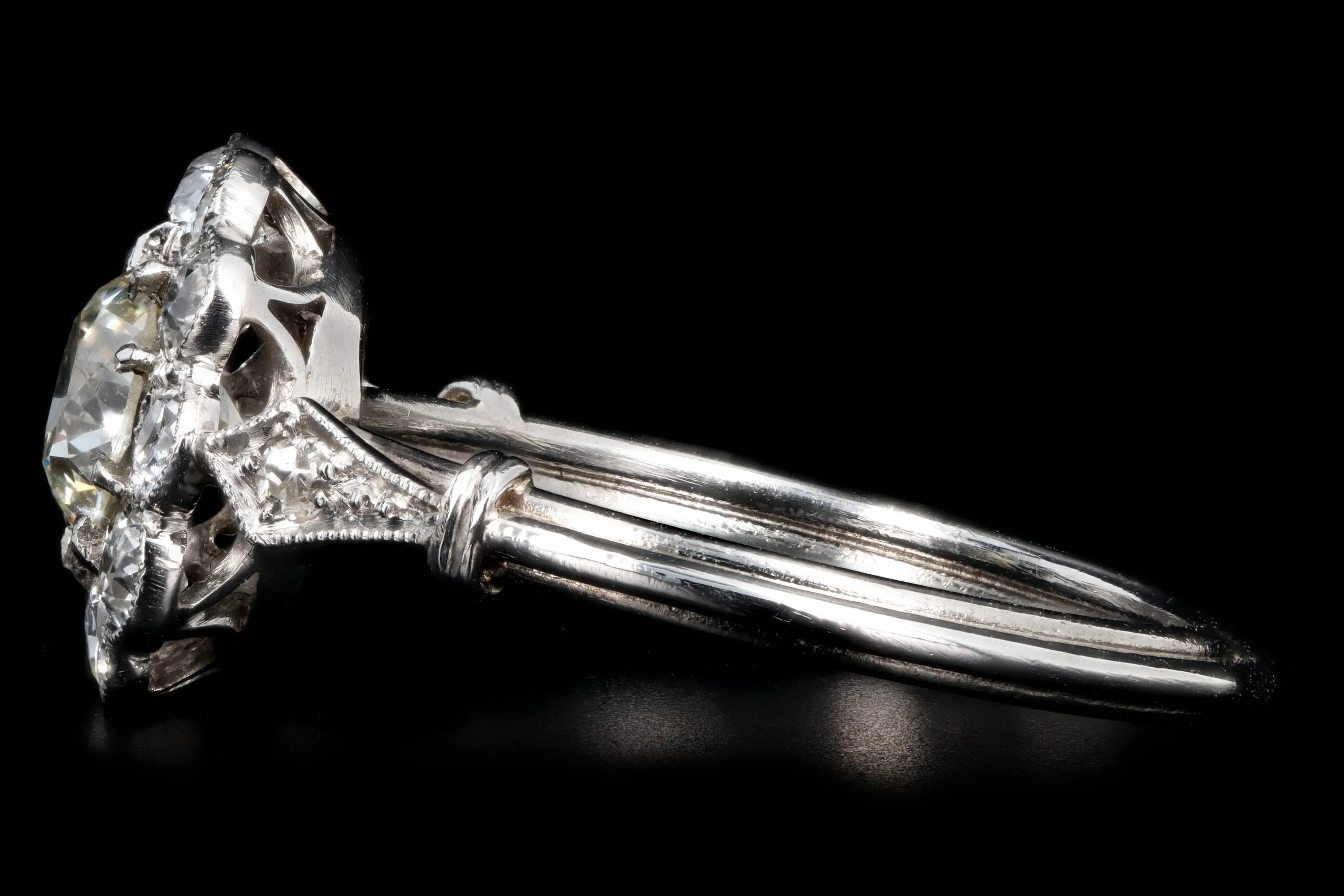Art Deco Inspired Platinum 0.72 Carat Old European Cut Diamond Halo Cluster Engagement Ring