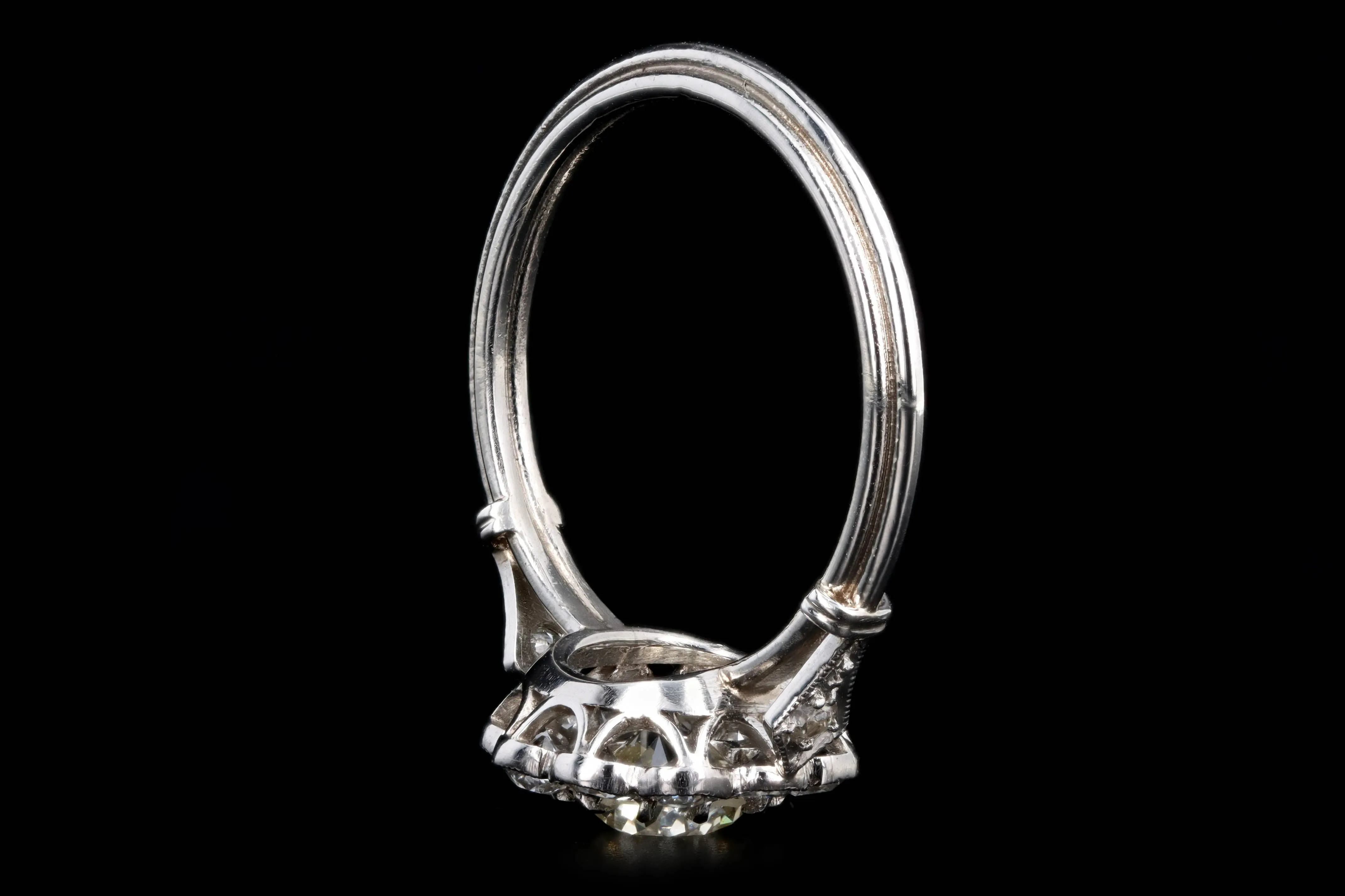 Art Deco Inspired Platinum 0.72 Carat Old European Cut Diamond Halo Cluster Engagement Ring