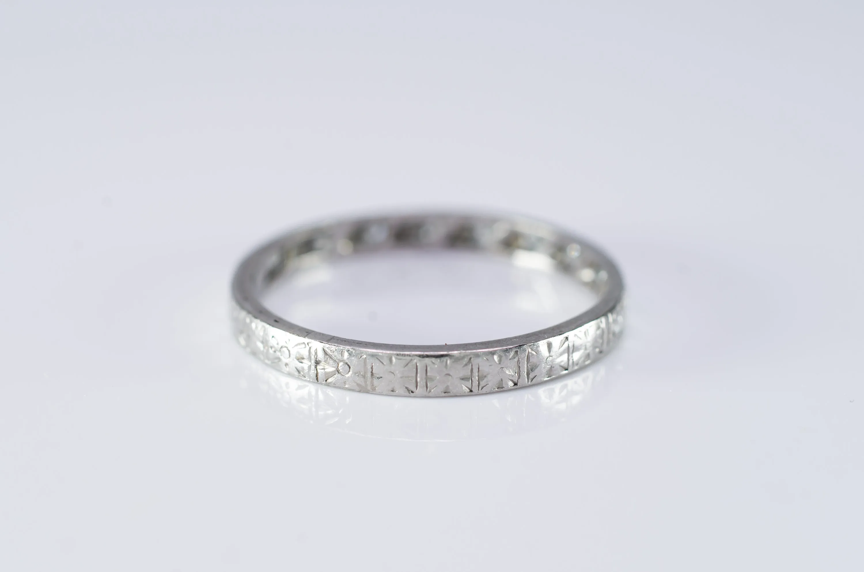ART DECO PLATINUM HALF ETERNITY BAND