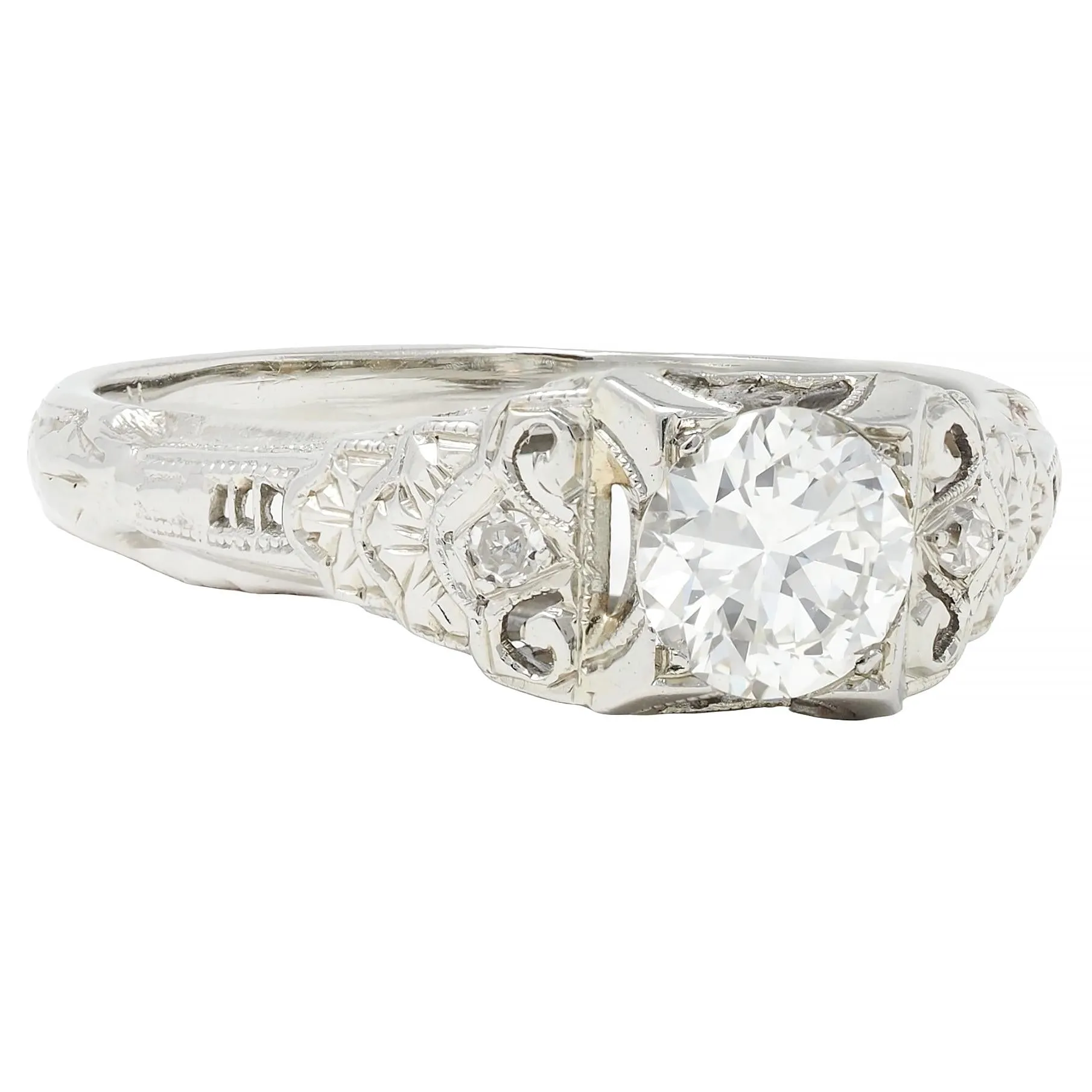 Late Art Deco 0.70 CTW European Cut Diamond 18 Karat White Gold Vintage Lotus Engagement Ring
