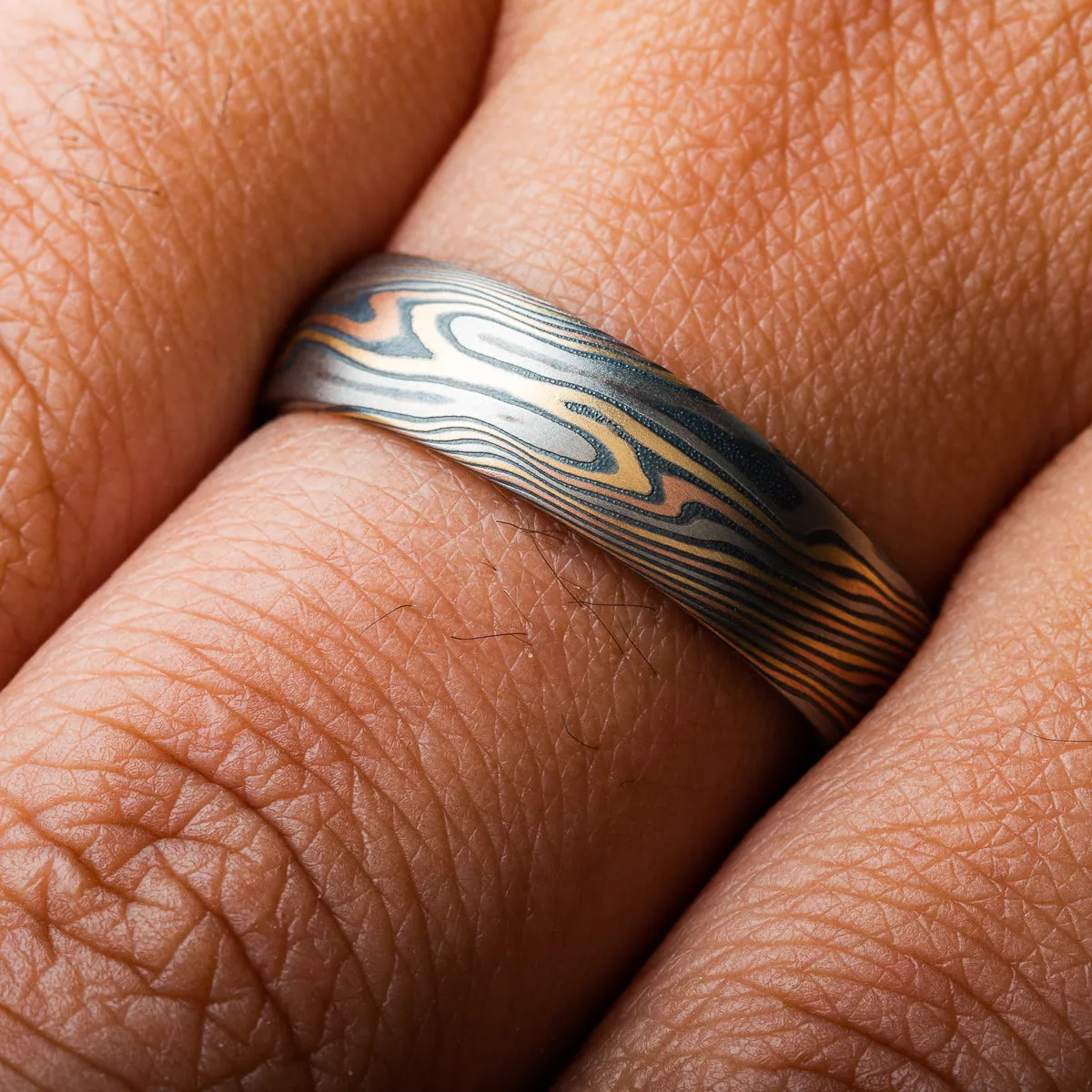Mokume Gane Rustic Wedding Band in Twist Pattern and Firestorm Palette