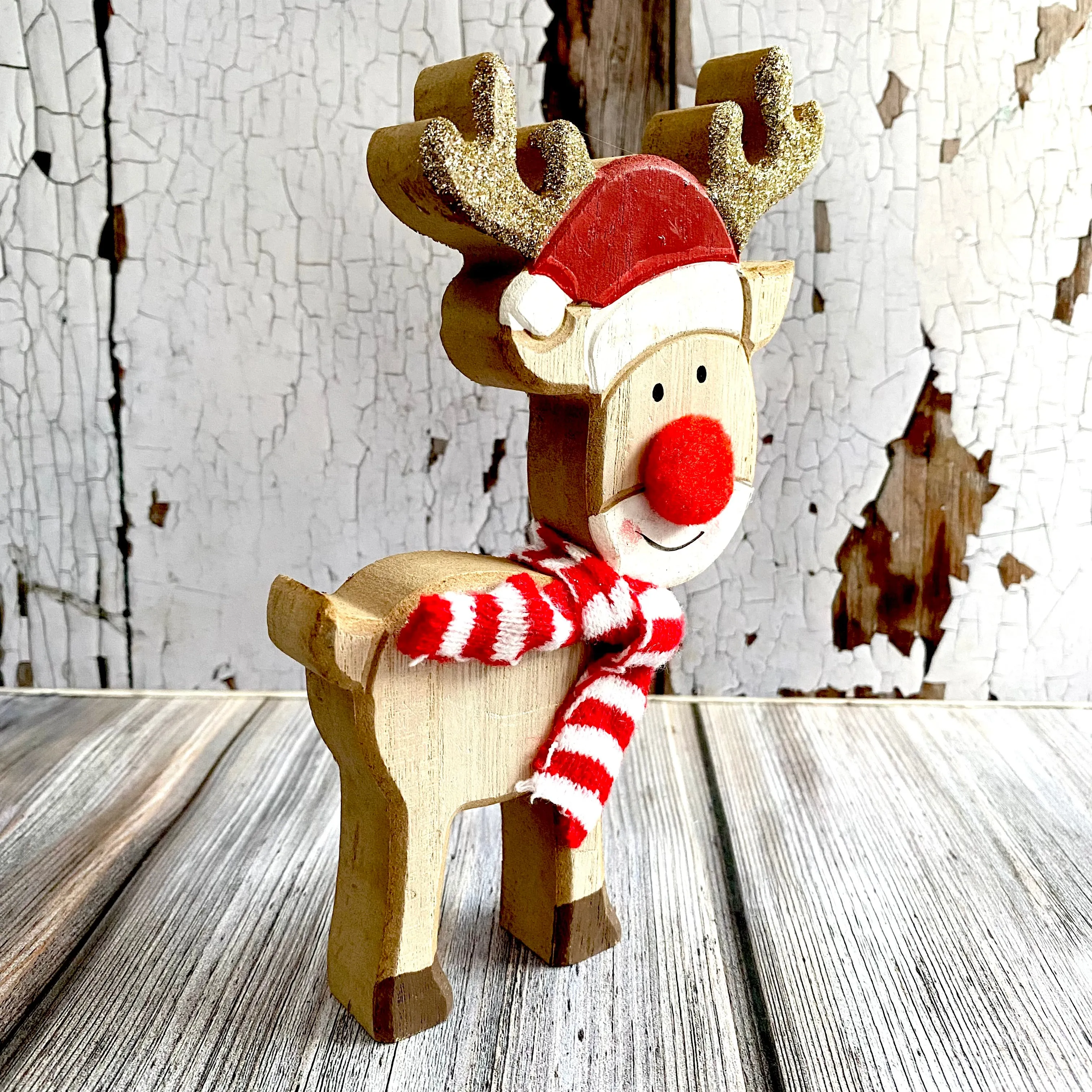 Rudolph with a red and white scarf