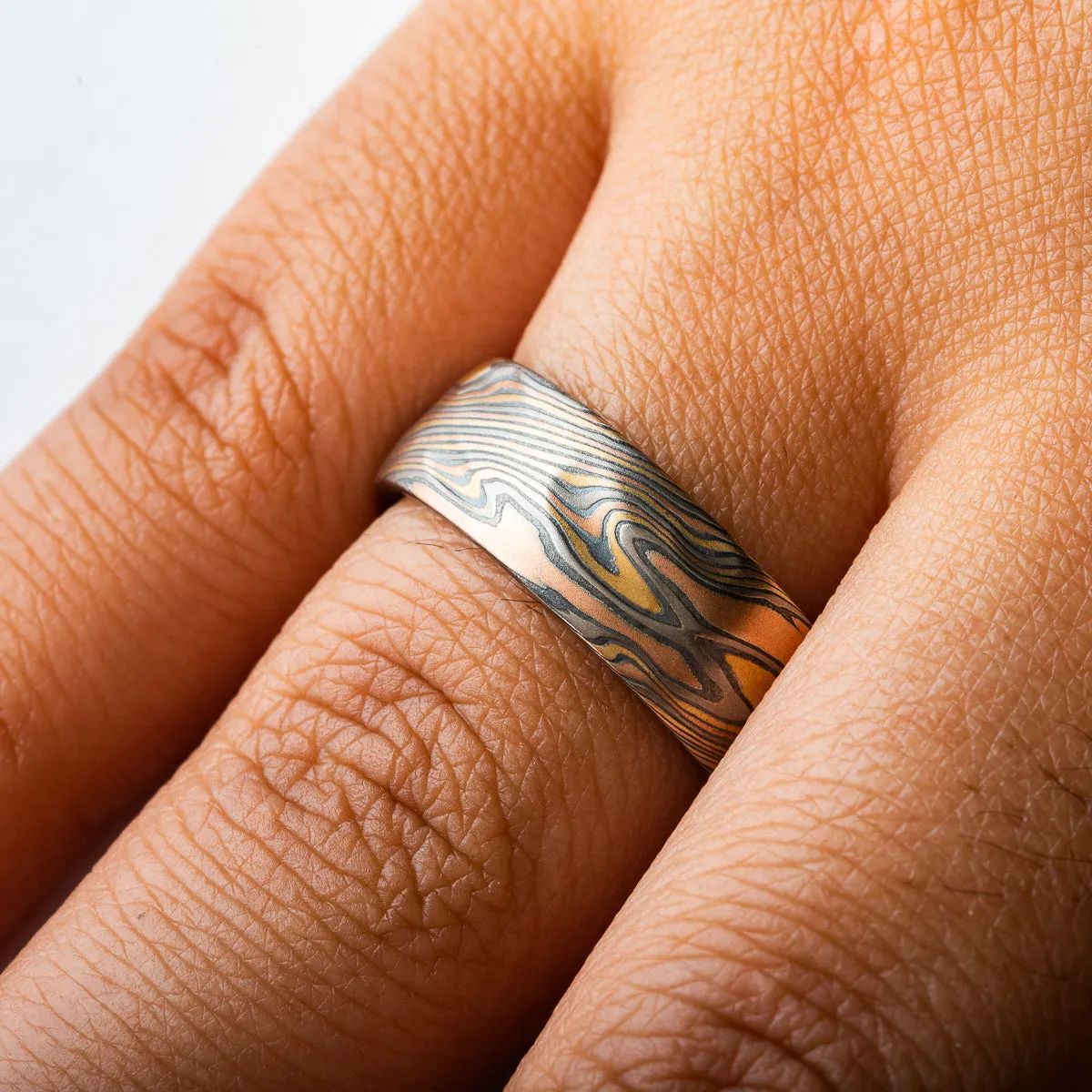 Rustic Mokume Gane Ring in Firestorm Palette and Twist Pattern with Kazaru