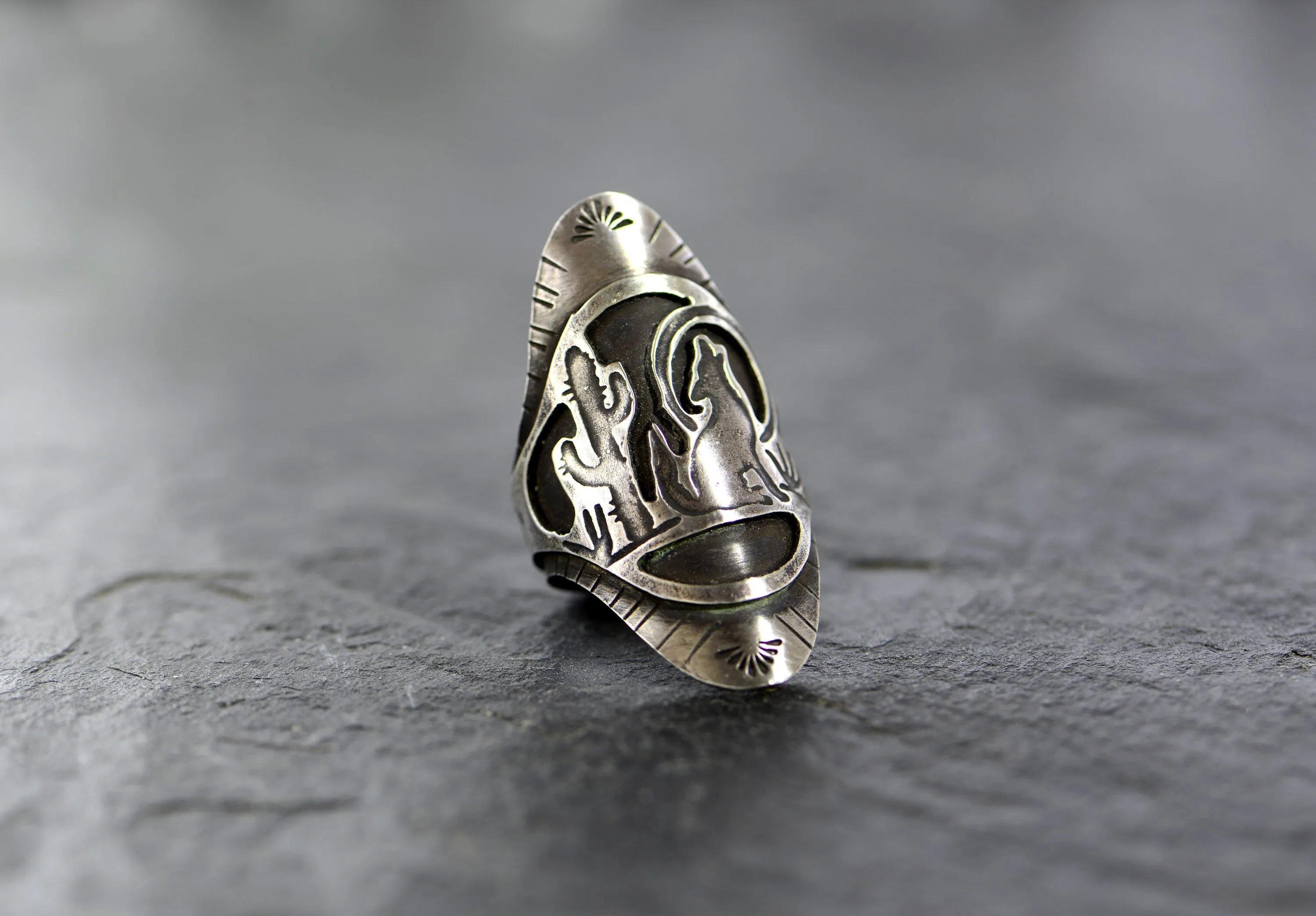 Saddle ring in sterling silver with howling coyote and Saguaro cactus