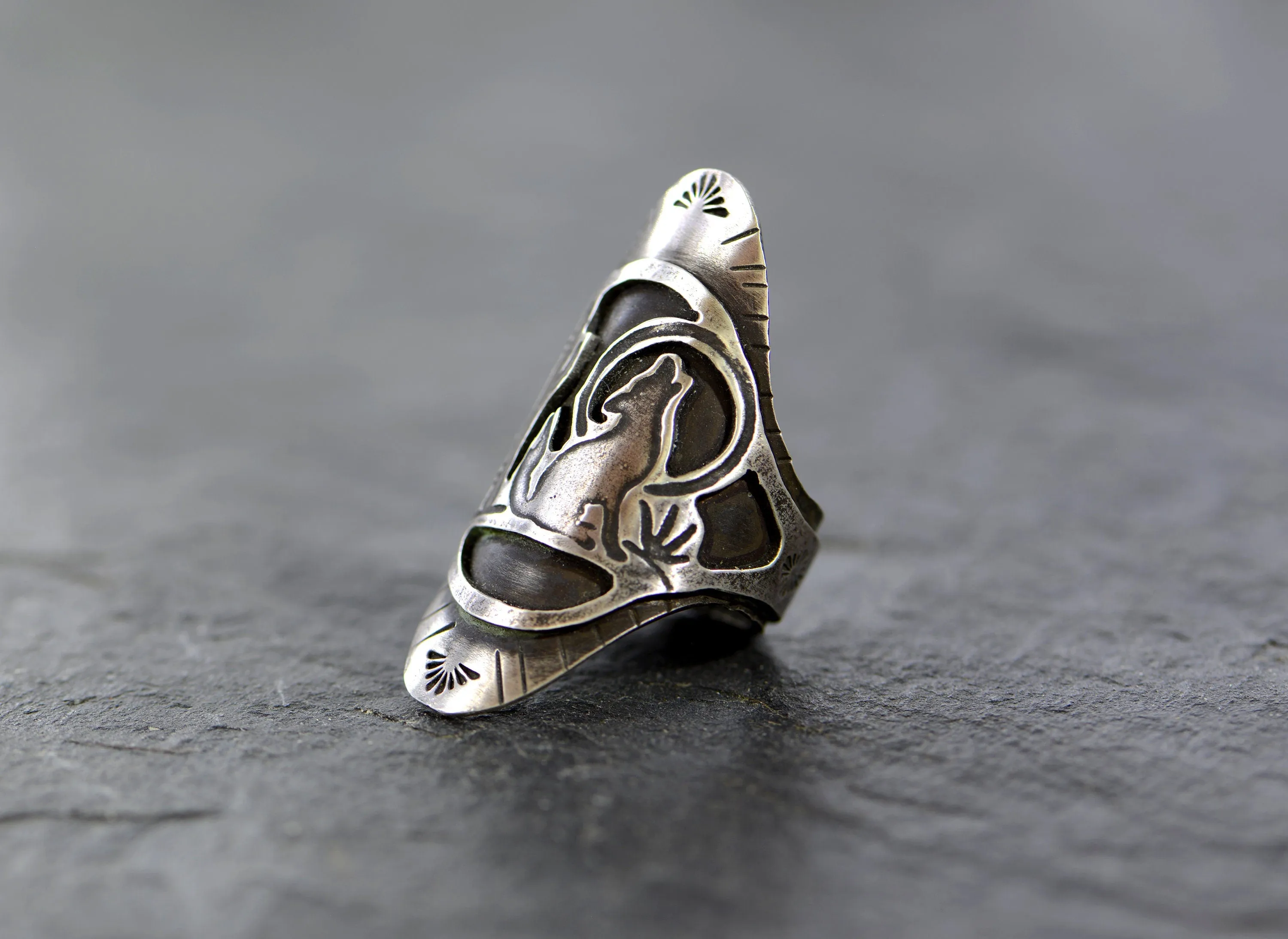 Saddle ring in sterling silver with howling coyote and Saguaro cactus