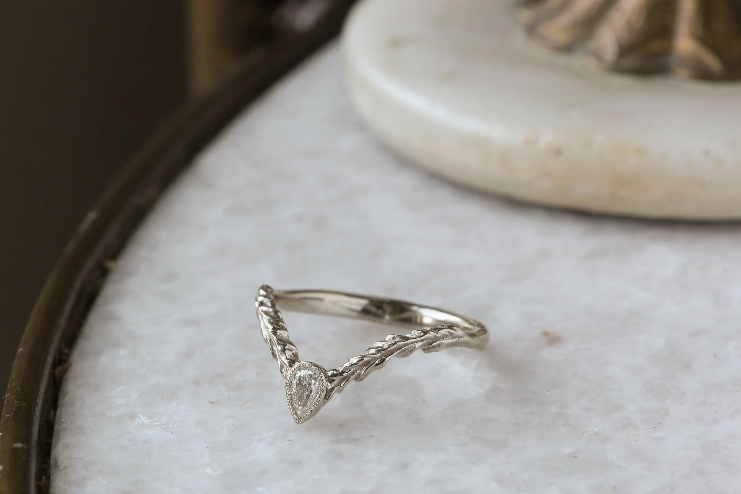 The Diadem of Dawn Band - Contoured Natural Pear Cut Diamond Band