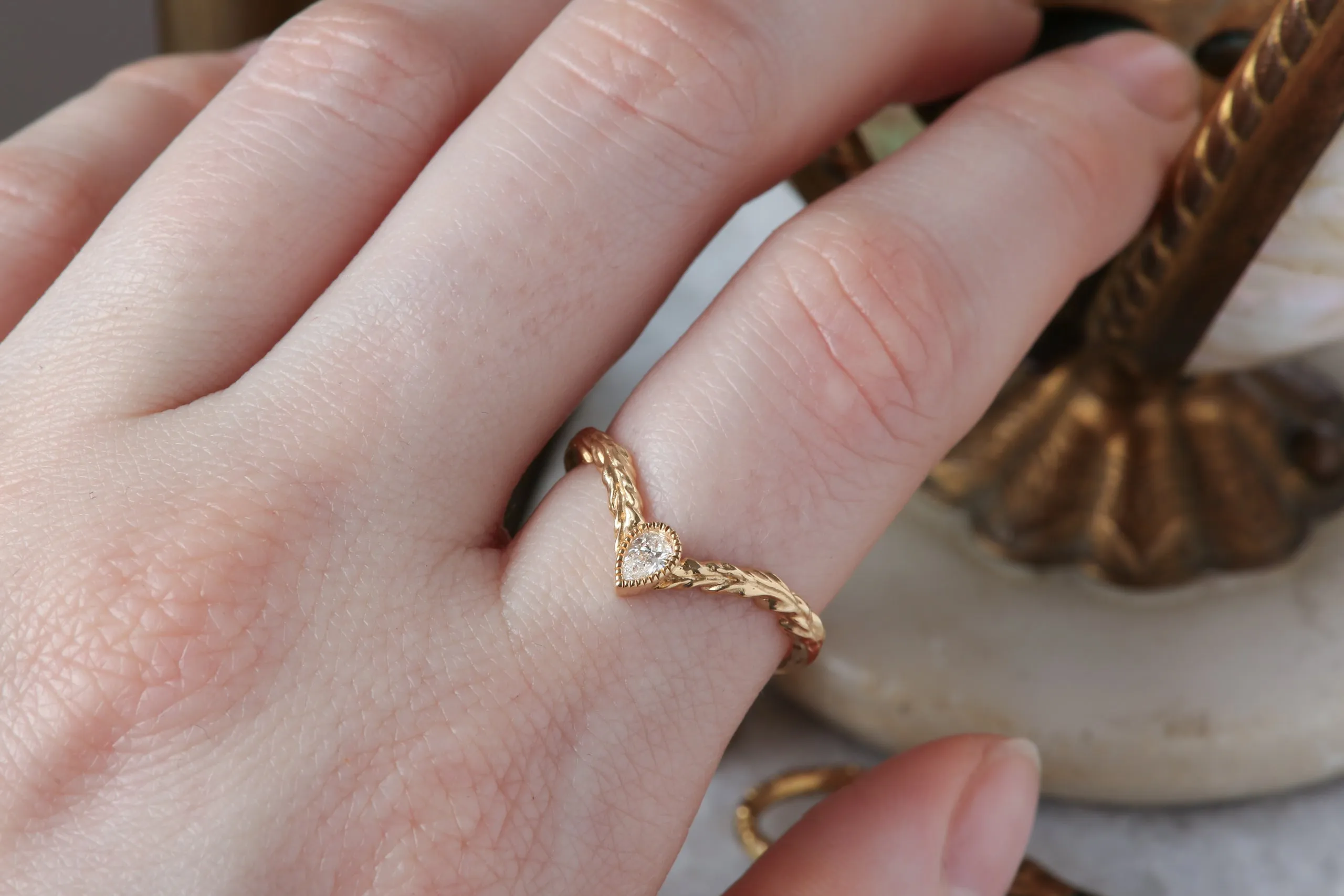 The Diadem of Dawn Band - Contoured Natural Pear Cut Diamond Band