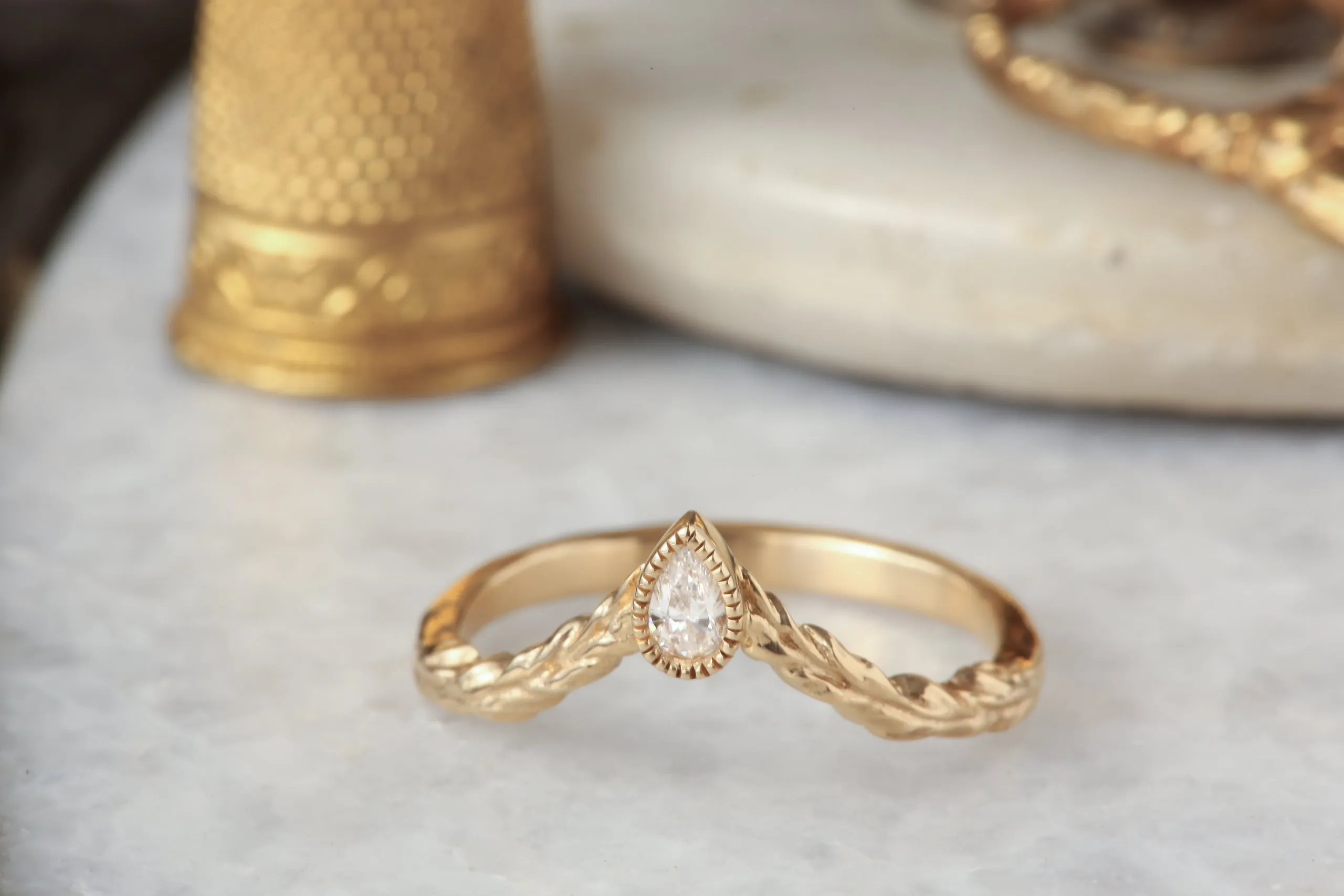 The Diadem of Dawn Band - Contoured Natural Pear Cut Diamond Band