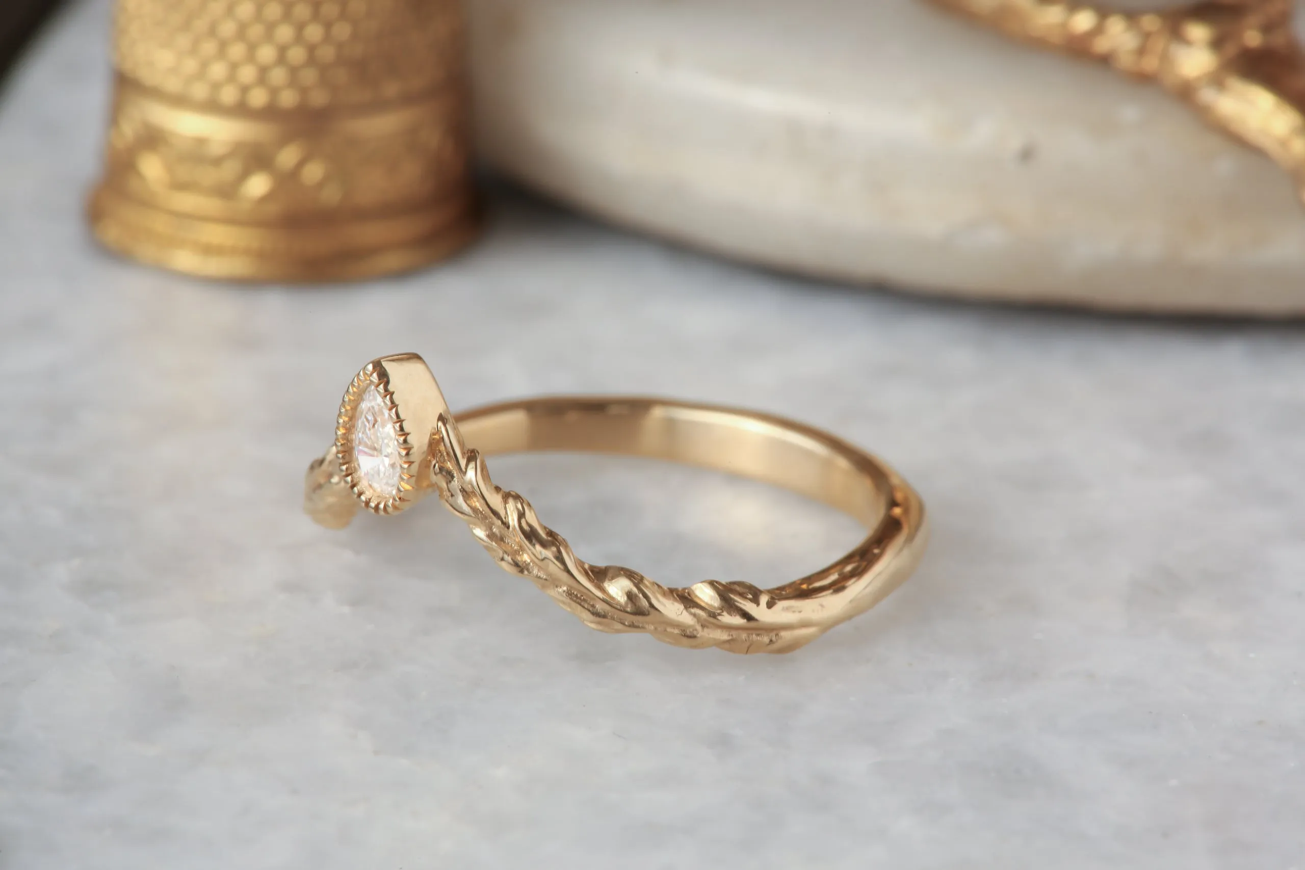 The Diadem of Dawn Band - Contoured Natural Pear Cut Diamond Band