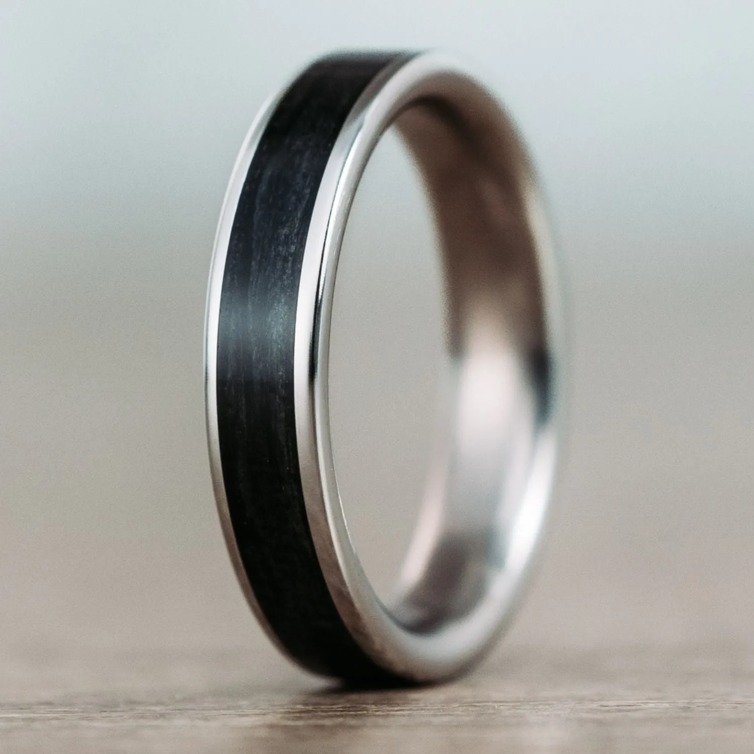 The Frontiersman & The Helen -  Black Whiskey Barrel and Titanium Wedding Band Set