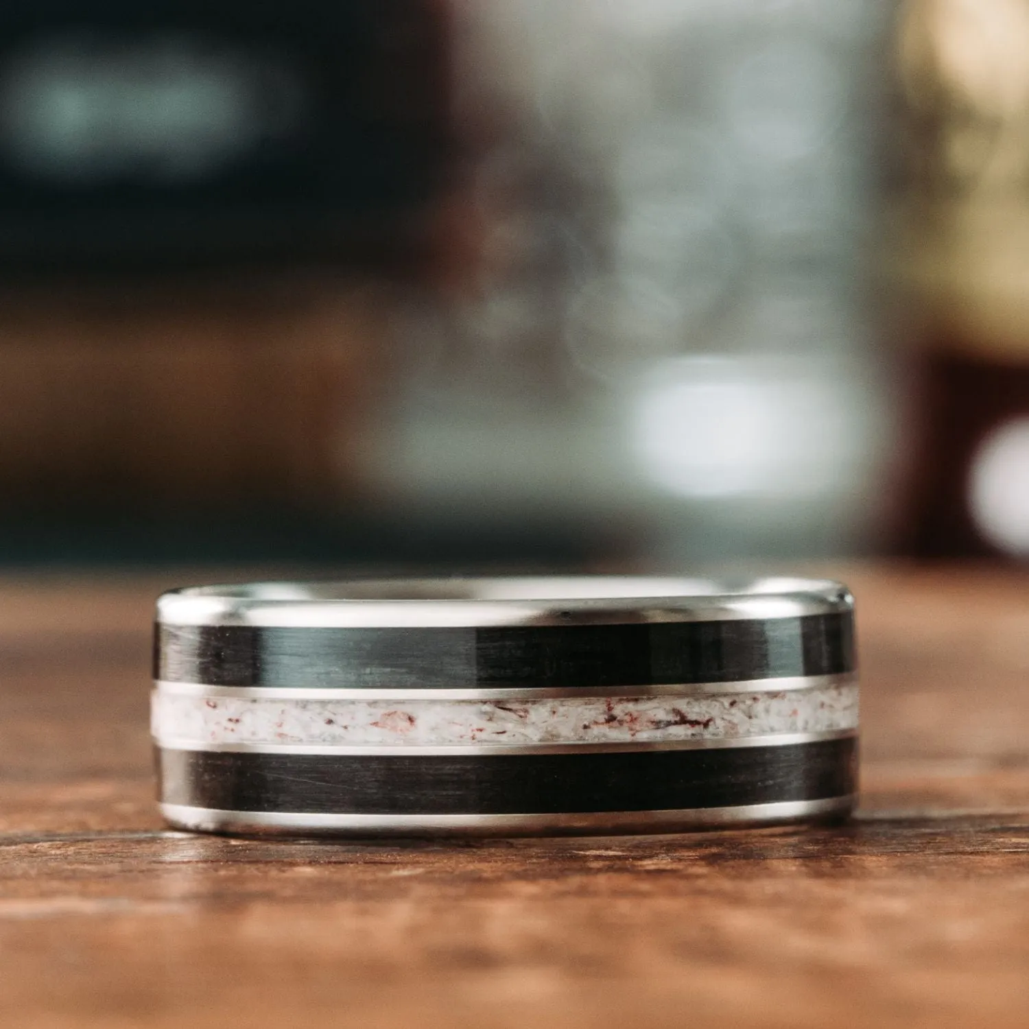 The Frontiersman & The Helen -  Black Whiskey Barrel and Titanium Wedding Band Set